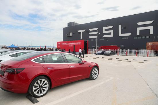 Tesla exports made-in-China Model 3 as global carmakers ride
